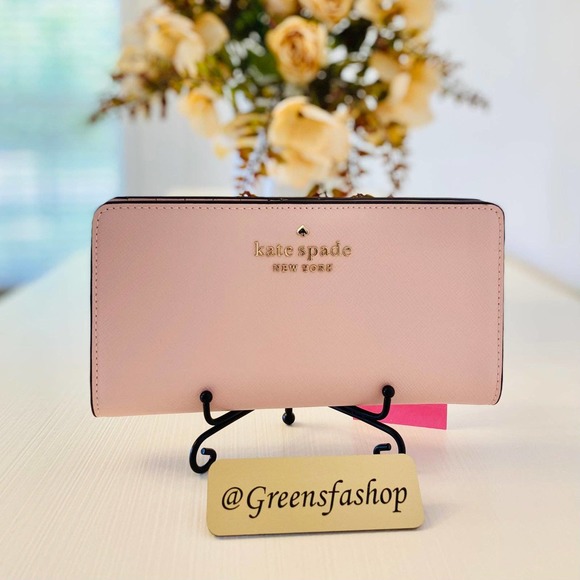 kate spade Handbags - Kate Spade staci large slim bifold wallet chalk pink